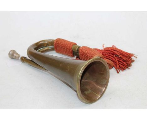 An early 20th century brass and copper bugle