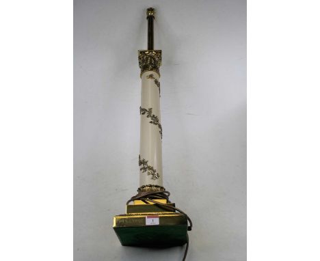 A 20th century brass table lamp in the form of a Corinthian column, relief decorated with trailing vines, height 80cmConditio