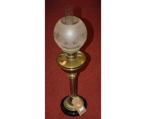 A Victorian brass pedestal oil lamp, having opalescent globular shade, on a fluted column and circular base, h.68cm 