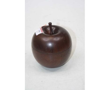 A polished hard wood caddy in the form of an apple, height 14cm