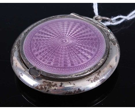 A ladies travelling silver and guilloche enamel powder compact  having gilt washed interior, dia. 5cm