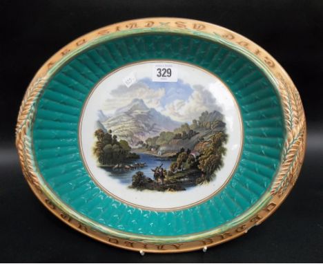 Victorian Prattware oval bread dish, printed with 2 figures in a mountainous lake landscape, the rim basket moulded and with 