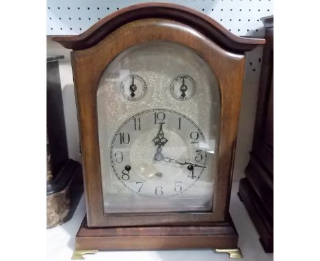 Edwardian three train bracket clock, the silver arched engraved dial with Arabic numerals and slow fast and chime silent subs