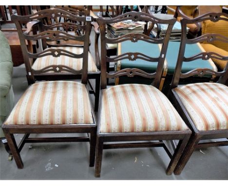 George III mahogany set of four ladder back dining chairs with drop in upholstered seats and chamfered legs, including one ca