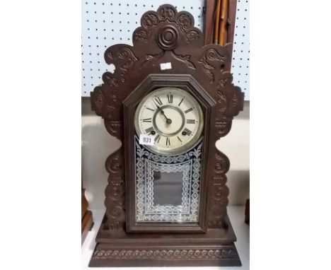 American Ansonia gingerbread mantel clock, height 22.75'.