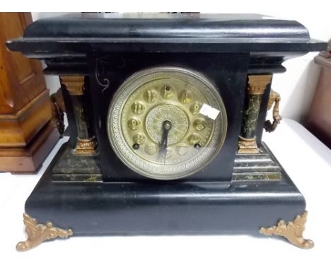 Ebonised simulated slate and marble two train mantel clock, width 15'.