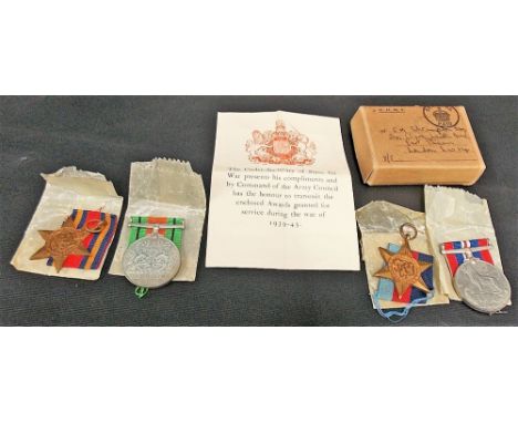 Set of four WWII British medals including the Defence Medal, War Medal 1939-1945, Star and Burma Star, awarded to R M SHRIMPT