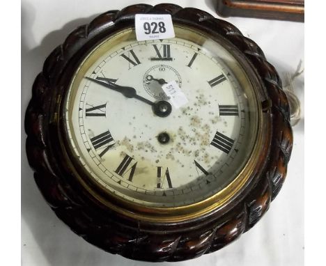 Dial wall clock within stained mahogany carved rope twist case, diameter 9'.