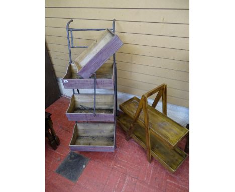 Metal framed stand with four wooden plant boxes and a two tier wooden planter stand