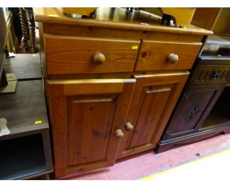 Dark wood small compact sideboard of two drawers over two base cupboards