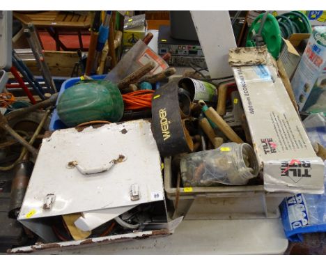 Plastic crate containing garage hand tools, hammers, grease guns, fixings, tile cutter, painted metal box containing bench sa