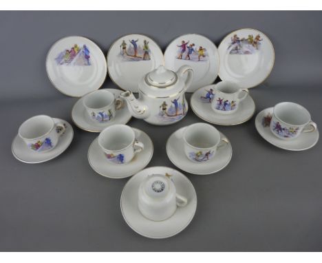 Early 20th Century child's nineteen piece teaset including teapot depicting youngsters having fun in the snow and ice