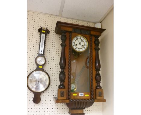 Vienna wall clock and a wall hanging barometer