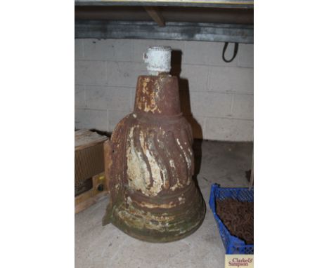 A vintage large cast iron water hopper of fluted design