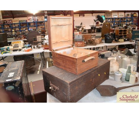 A vintage pine trunk and a wine carrying box