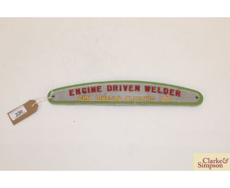 A cast metal and painted sign "Engine Driven Welder, G.K.N.Lincoln Electric Ltd", approx. 14" x 2½"