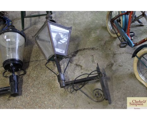 A converted vintage copper and glazed outside lamp 