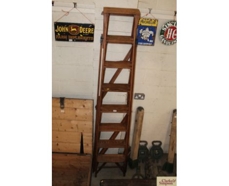 A vintage wooden "Hatherly Jones Patent" lattice step ladder