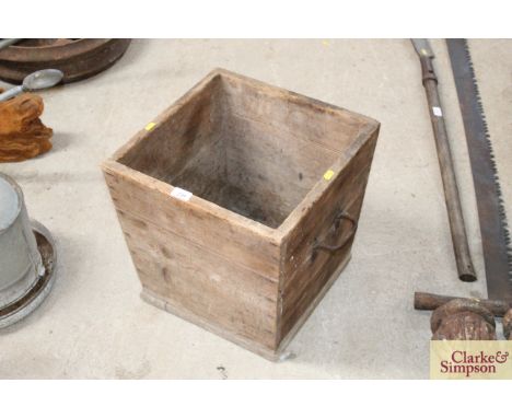 A pine corn hopper with iron side carrying handles