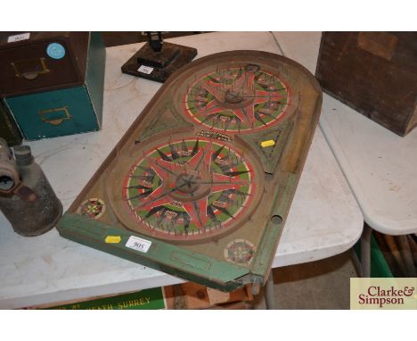 A Lindstom's Gold Star tin plate Bagatelle board 