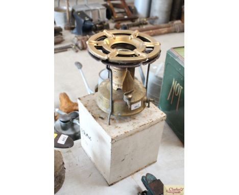 A vintage Primus stove in metal box