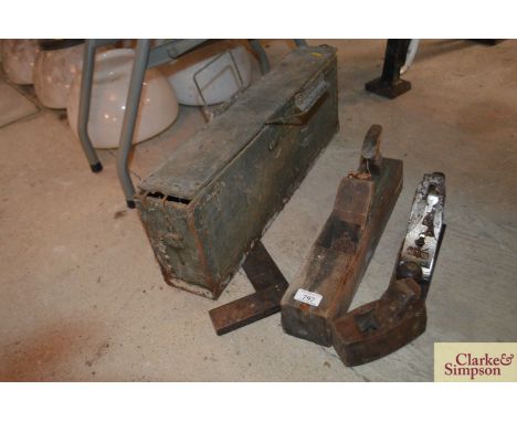 A Record plane, two wooden planes, a set square and an ammunition box 