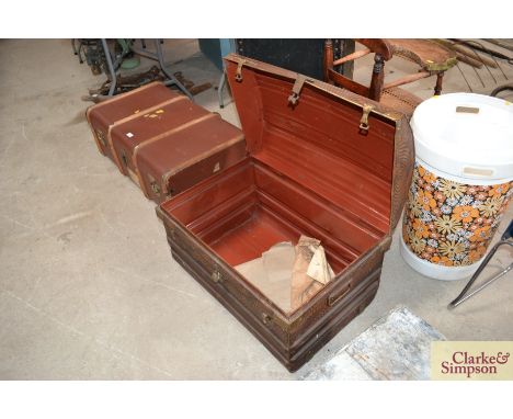 A Victorian japanned dome topped tin trunk 