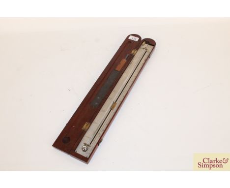 A mahogany cased thermometer with silvered scale, approx. 21"