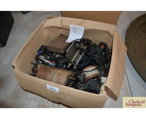 A box of miscellaneous vintage radio tuners and coils