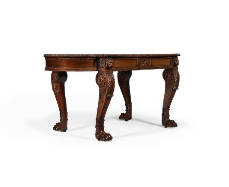Y&nbspA FINE GEORGE IV CARVED ROSEWOOD WRITING TABLE  CIRCA 1820  With a gilt tooled leather inset top, two concealed frieze 