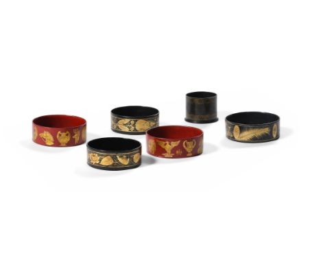 A GROUP OF EIGHT PAPIER-MÂCHÉ WINE COASTERS To include: A Regency style matched pair in black and gilt, floral vignettes with