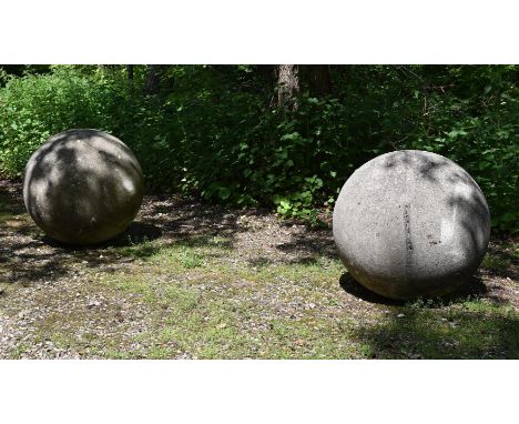 A LARGE PAIR OF STONE COMPOSITION BALLS 20TH CENTURY  each approximately 70cm diameter   Condition Report:  With weathering -