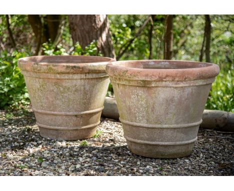 A LARGE PAIR OF TERRACOTTA POTS  LATE 20TH CENTURY  each 56cm high, 71cm diameter  Condition Report:  With weathering - colou