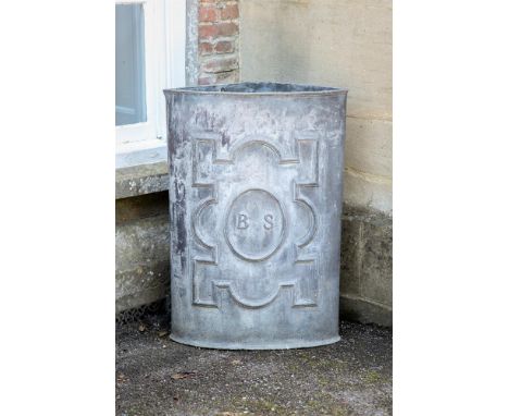 A GEORGE III LEAD CORNER CISTERN  LATE 18TH CENTURY  Raised lettering to central cartouche BS  91cm high, 65cm wide, 36cm dee