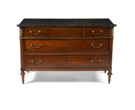 A DIRECTOIRE MAHOGANY AND BRASS MOUNTED COMMODE LATE 18TH CENTURY With a fossilised black marble top 83cm high, 127cm wide, 5