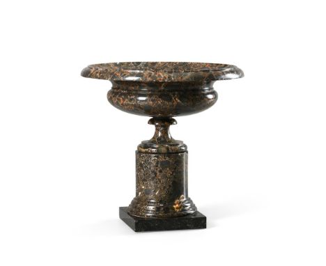 AN ITALIAN PORTOR MARBLE TAZZA CIRCA 1830 The marble with dark black ground and yellow/orange veining 40.5cm high, top 42cm d