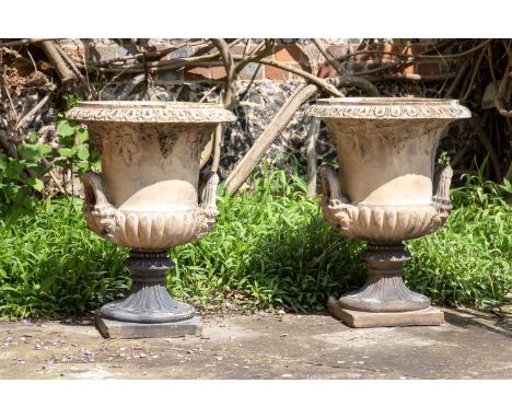 A LARGE PAIR OF BUFF TERRACOTTA URNS BY DOULTON LAMBETH, LATE 19TH CENTURY  Of twin handled Campana form, pedestal bases, app