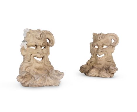 A PAIR OF CARVED MARBLE SATYR MASKS PROBABLY ITALIAN, 19TH CENTURY each 22cm high, 20cm wide  Condition Report:  With wear, m