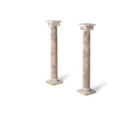 A PAIR OF STATUARY AND SIENA MARBLE FLUTED COLUMNS  19TH CENTURY  Carved in the Ionic order  each 116.5cm high, the tops 20 x