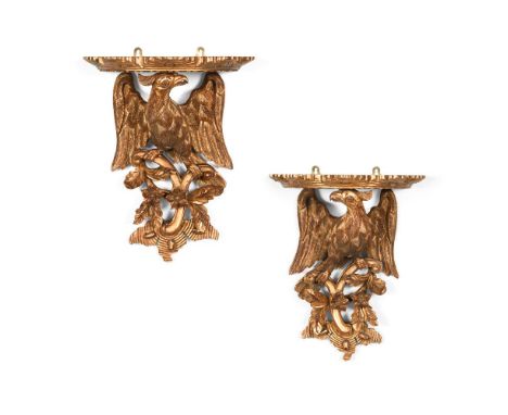 A PAIR OF CARVED GILTWOOD WALL BRACKETS  IN THE GEORGE II STYLE, 20TH CENTURY  Each with eagle in branch support  each 41.5cm