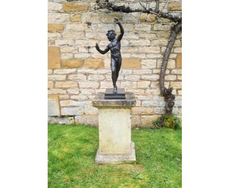 AFTER THE ANTIQUE, A BRONZE FIGURE OF THE DANCING FAUN 20TH CENTURY  On an associated limestone and mixed stone pedestal figu