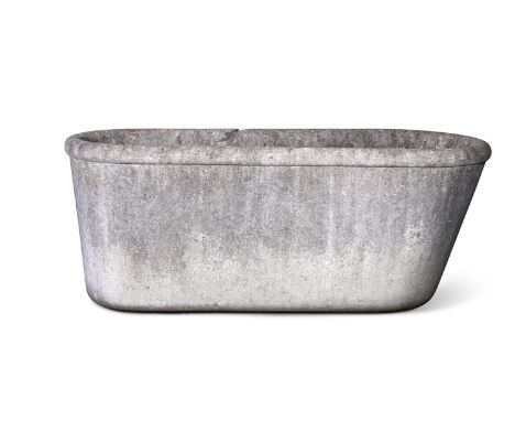 A LARGE CARVED MARBLE BATH IN THE MANNER OF A ROMAN LABRUM  POSSIBLY 19TH CENTURY  70cm high, 181cm wide, 76cm deep  Conditio
