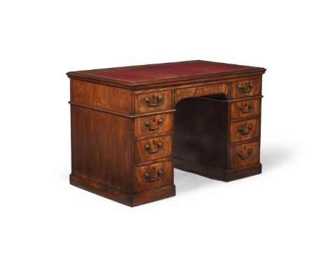 A GEORGE III MAHOGANY ARCHITECT'S DESK LATE 18TH CENTURY With a tooled red leather inset double-ratchet adjustable top, the t