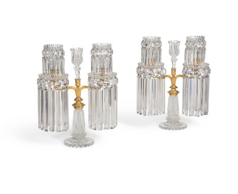 A PAIR OF REGENCY CUT GLASS TABLE LUSTRES  EARLY 19TH CENTURY, IN THE MANNER OF JOHN BLADES  Of pillar and file form, twin do