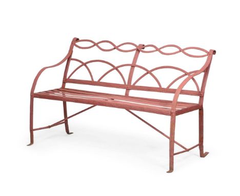 A REGENCY RED PAINTED IRON STRAPWORK GARDEN BENCH  CIRCA 1815  84.5cm high, 143cm wide, 56cm deep overall    Condition Report
