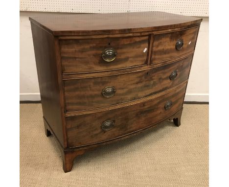 A 19th Century mahogany bow fronted chest of two short over two long graduated drawers on splayed bracket feet, 108 cm wide x