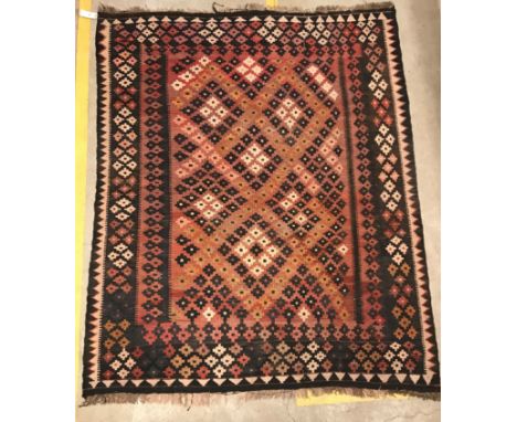 A Kelim rug in red and black, approx 189 cm x 152 cm, together with a modern Chinese rug, the central panel depicting two dra