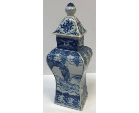 A Chinese blue and white rectangular vase of baluster form, decorated with figures, flowers and household objects, bearing si