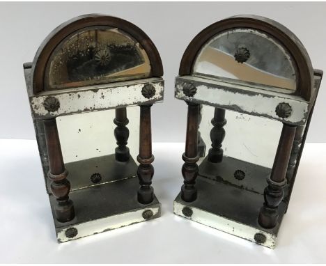 A pair of 19th Century mahogany and mirrored domed wall brackets of small proportions with column decoration, 11 cm wide x 21