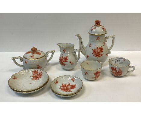 A Herend oxide red decorated duet coffee set comprising teapot, cream jug, sugar basin and cover, two cups and saucers and tw